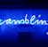 A bright blue neon sign spells out the word 'gambling' in cursive script. The background features a textured wall covered in domino tiles, also illuminated by the blue light, creating a vivid and visually striking scene.